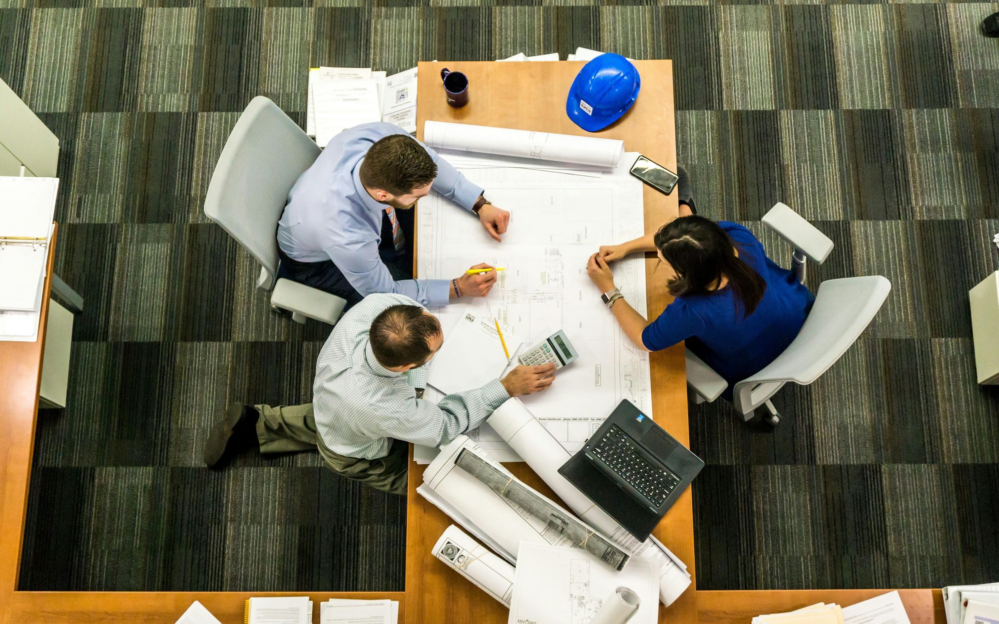 Professionals collaborating on a project